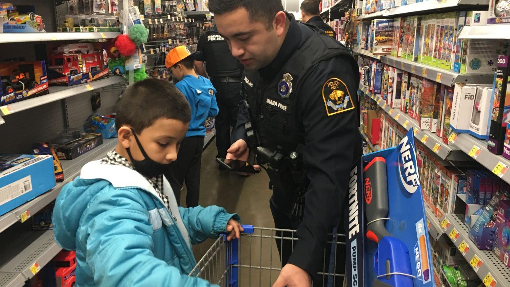 Omaha police union's Shop with a Cop event helps about 30 children in need